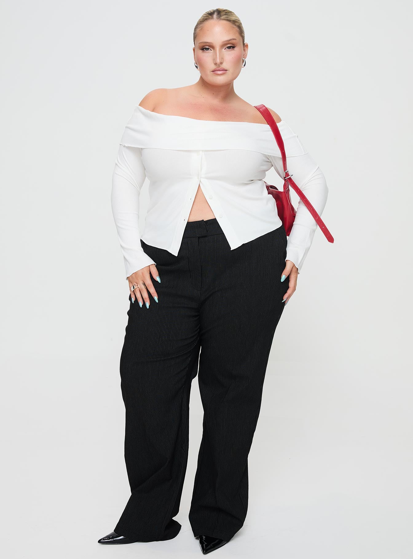 front view of model wearing Princess Polly Jeller Pinstripe Pants Black Curve High Waisted Pants 
