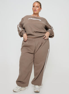 front view of model wearing Princess Polly Princess Polly Track Pants Stripe Taupe / White Curve 