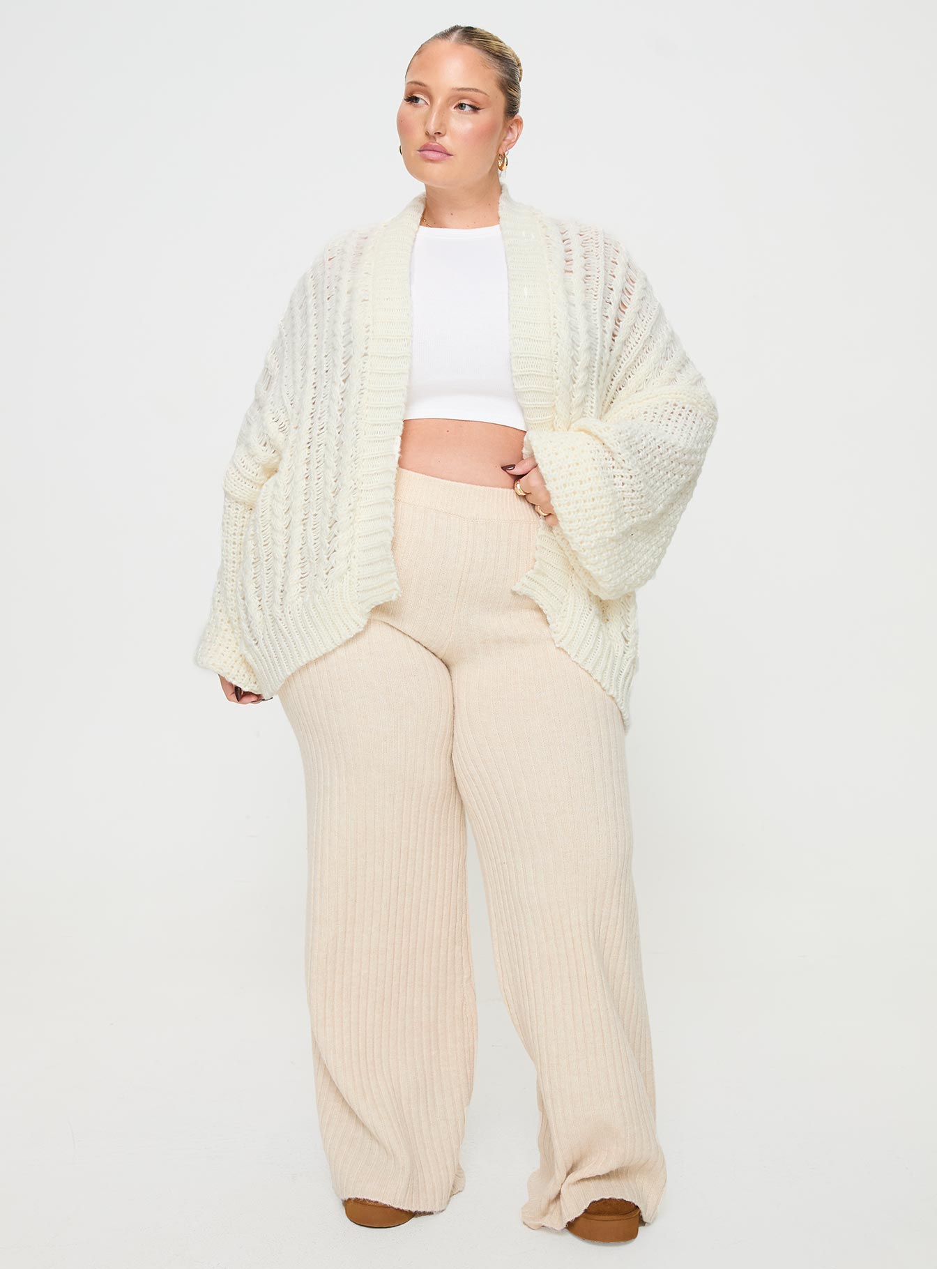 front view of model wearing Princess Polly Abner Cable Cardigan Cream Curve 