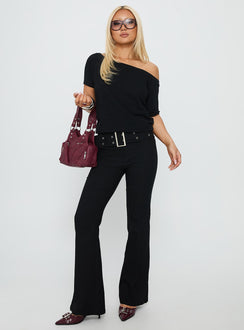 front view of model wearing Princess Polly Kortnee Eyelet Detail Flare Leg Pants Black Low Rise Pants 
