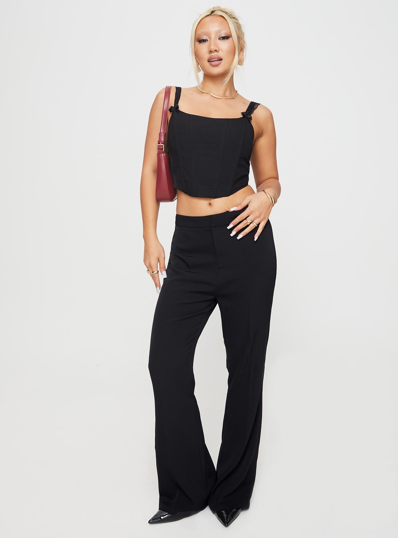 front view of model wearing Princess Polly Thaxten Top Black Sleeveless Square Neck 