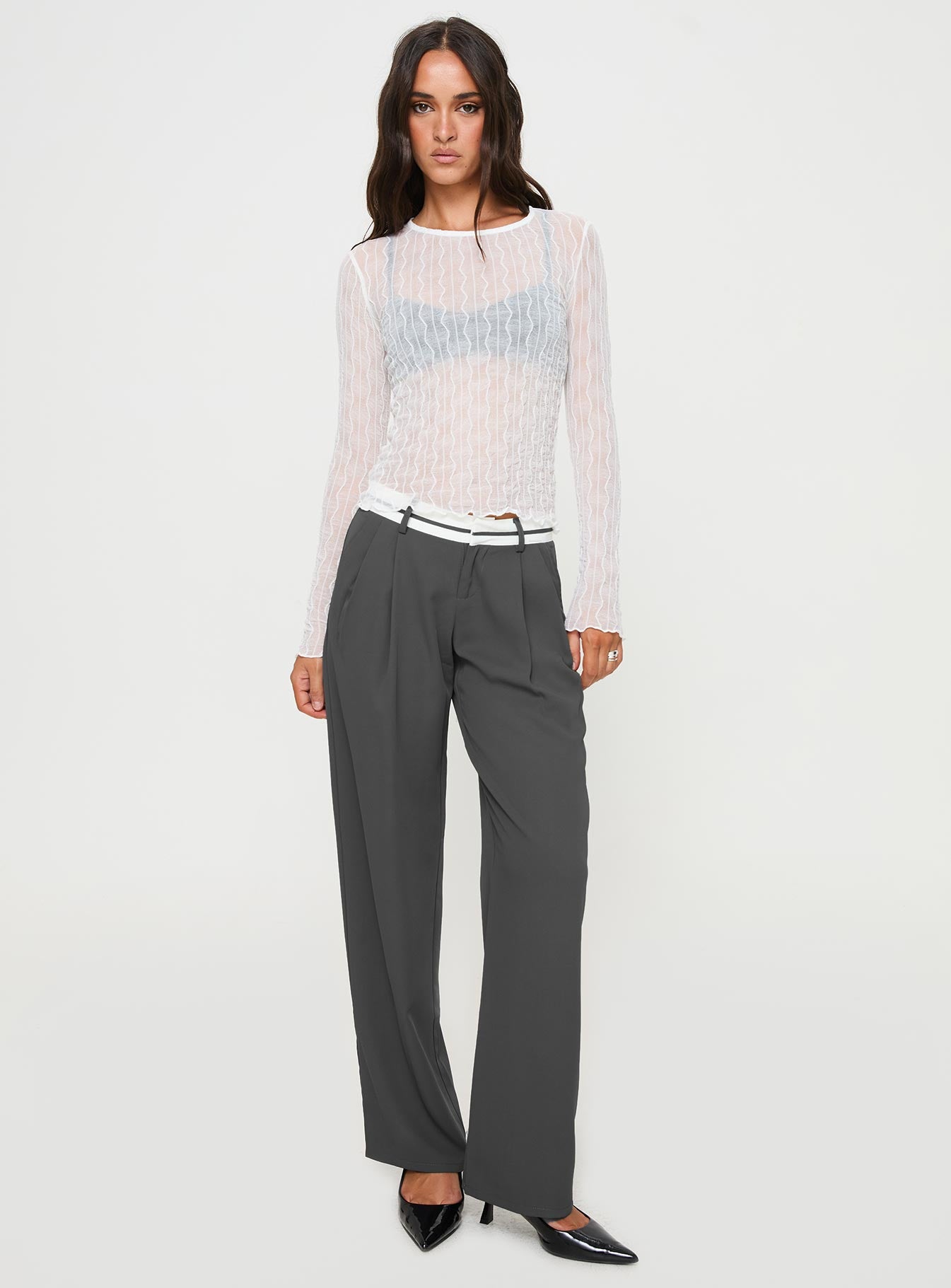 side view of model wearing Princess Polly Macgraw Long Sleeve Top White Full Sleeves Crew Neck 