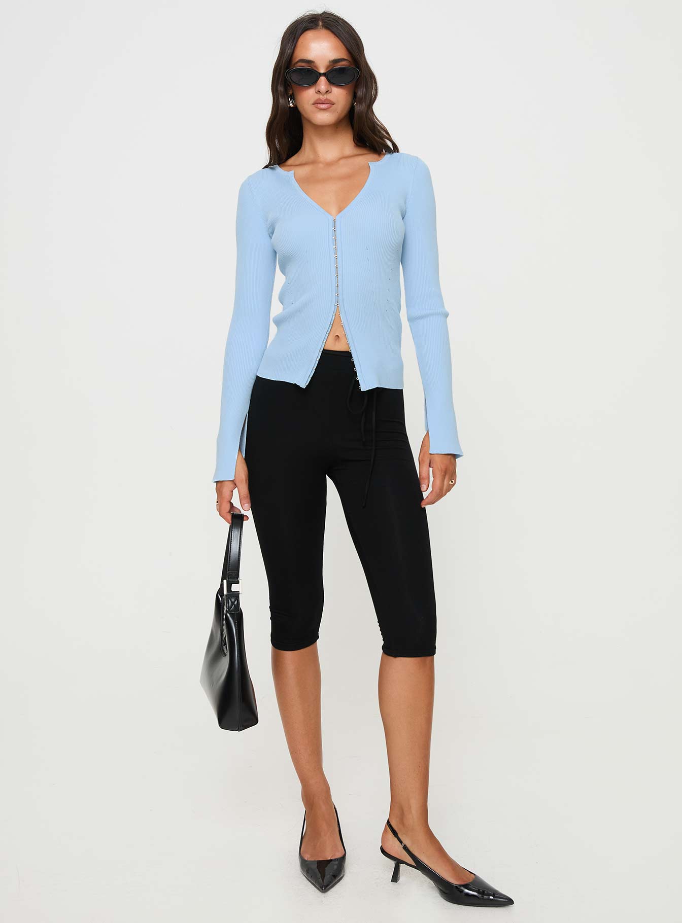 front view of model wearing Princess Polly Selections Long Sleeve Top Blue Full Sleeves V-Neck 