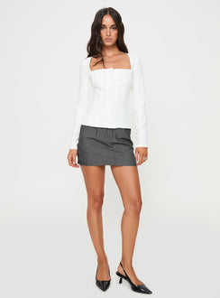 side view of model wearing Princess Polly Gaskin Long Sleeve Top White Full Sleeves Square Neck 