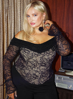 Front view of model wearing  front Princess Polly Full Sleeves Boat Neck  Cherli Lace Corset Top Black Curve