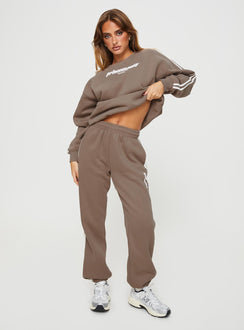 front view of model wearing Princess Polly Princess Polly Track Pants Stripe Taupe / White High Waisted Pants 
