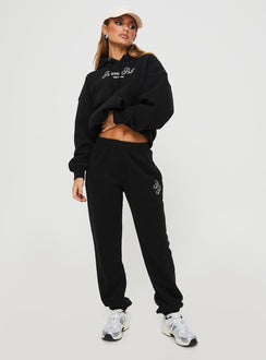 front view of model wearing Princess Polly Princess Polly Track Pants Script Black / Ivory High Waisted Pants 