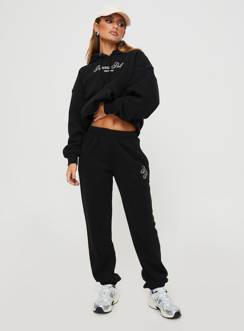 front view of model wearing Princess Polly Princess Polly Track Pants Script Black / Ivory High Waisted Pants 