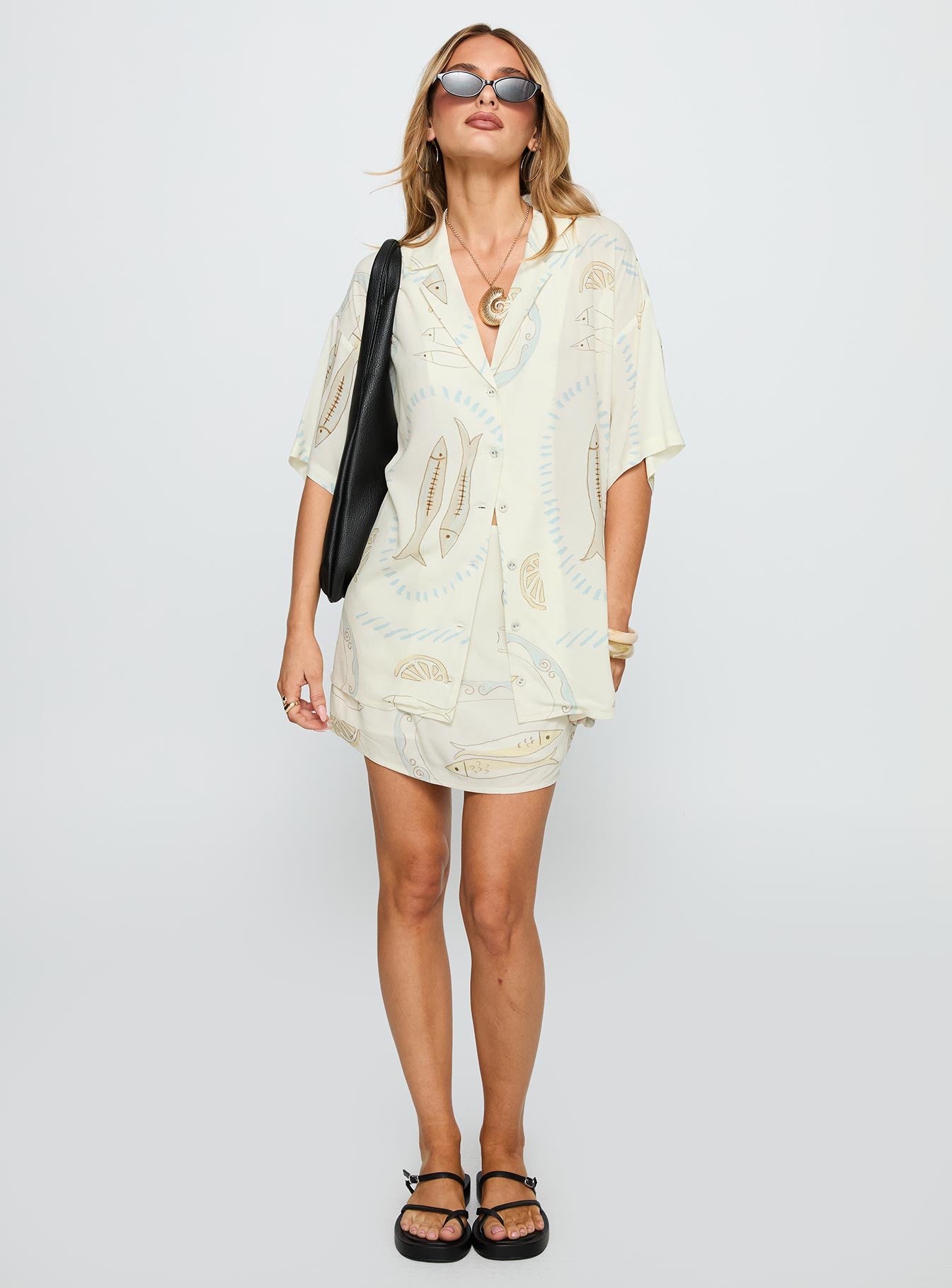 front view of model wearing Princess Polly Caraliia Shirt Cream Half Sleeves V-Neck 