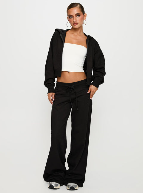 front view of model wearing Princess Polly Mindful Low Rise Pant Black Low Rise Pants 