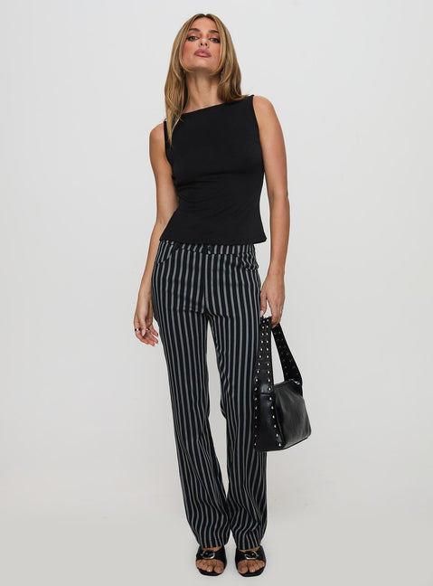 front view of model wearing Princess Polly Allude Low Waist Pinstripe Pant Black Low Rise Pants 