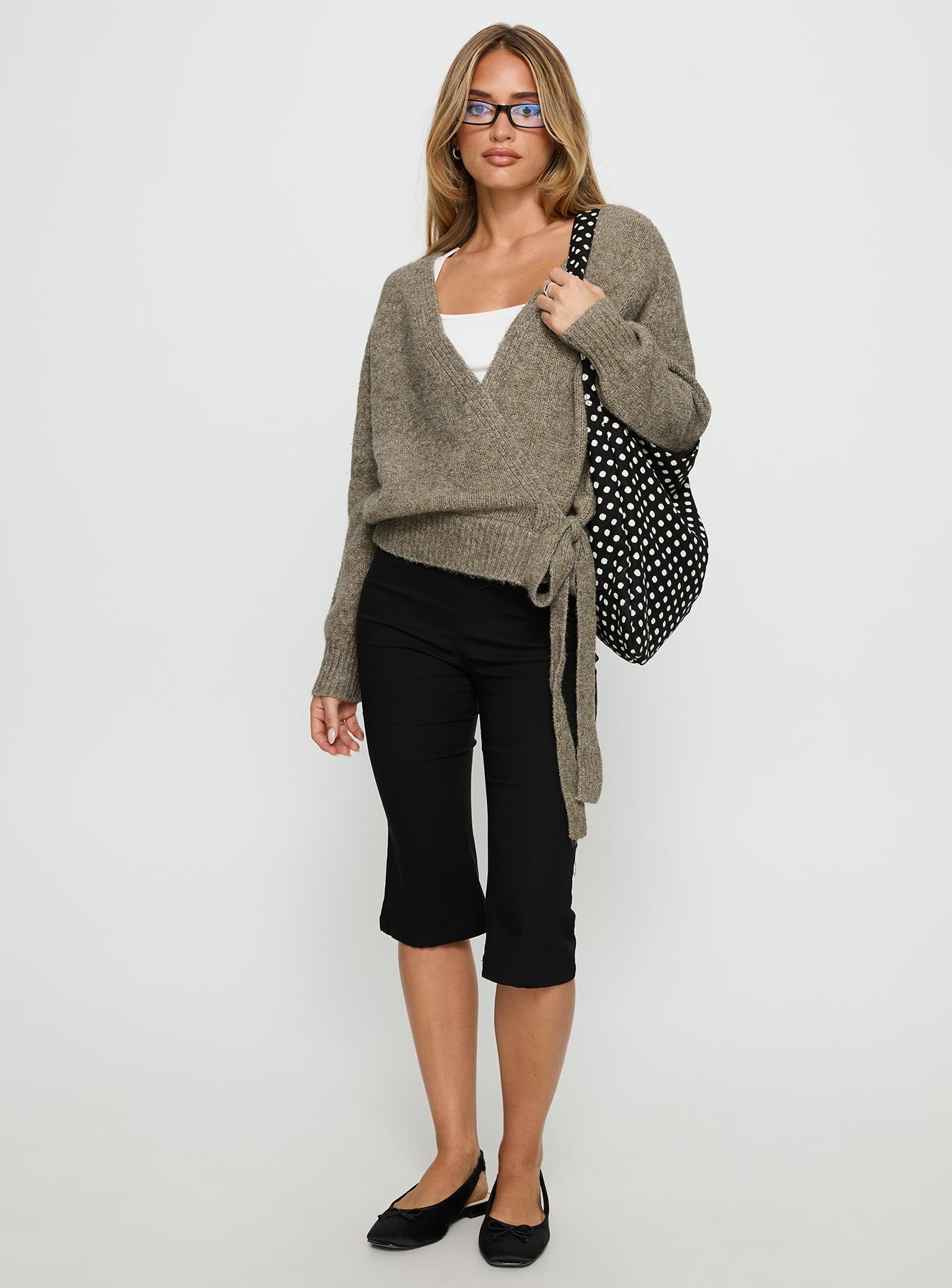 front view of model wearing Princess Polly Daelan Wrap Knit Cardigan Brown Cropped Jumpers 