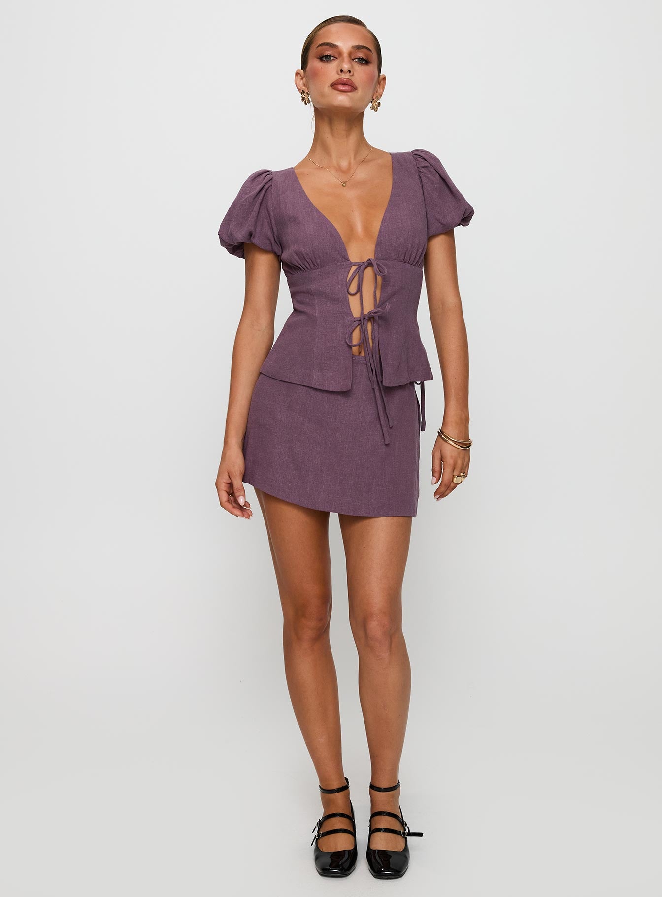 front view of model wearing Princess Polly Wilhelmina Blouse Top Mauve Short Sleeves Plunger 