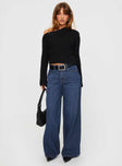 front view of model wearing Princess Polly Naylor Wide Leg Jeans Mid Blue Denim Petite Mid Rise 