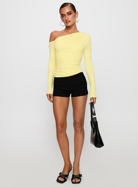 back view of model wearing Princess Polly Beller Long Sleeve Top Lemon Full Sleeves Asymmetric Neckline 