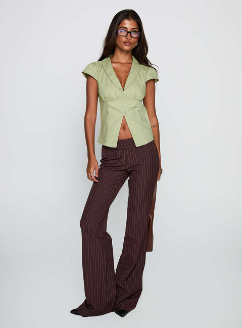 front view of model wearing Princess Polly Crowd Control Collared Top Sage Short Sleeves Plunger 