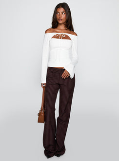 back view of model wearing Princess Polly Kinkirk Flared Pants Brown Pinstripe Low Rise Pants 