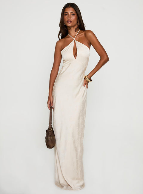 side view of model wearing Princess Polly Limosina Halter Maxi Dress Champagne Plunger 