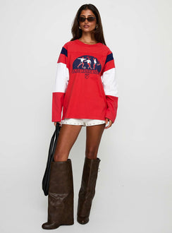 front view of model wearing Princess Polly MLS 96 Retro Long Sleeve Top Red Full Sleeves Crew Neck 