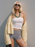 side view of model wearing Princess Polly Artha Cardigan Lemon Cropped 