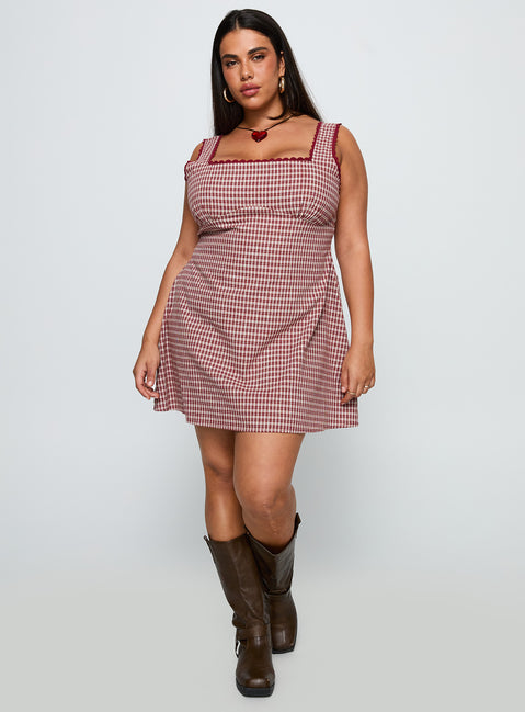 side view of model wearing Princess Polly Dasha Mini Dress Red Check Curve Square Neck 