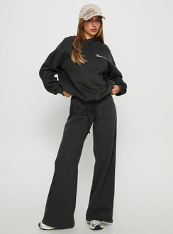 front view of model wearing Princess Polly Princess Polly Stargirl Wide Leg Sweat Pants Charcoal High Rise Pants 