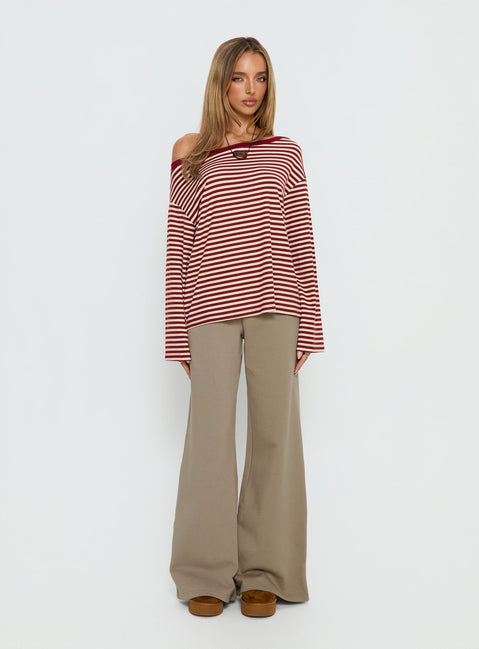 front view of model wearing Princess Polly Ralyssa Off Shoulder Long Sleeve Top Red Stripe Longline Jumpers 