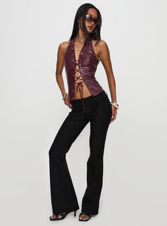 side view of model wearing Princess Polly I've Been There Faux Leather Halter Top Red Sleeveless V-Neck 