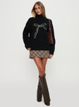 side view of model wearing Princess Polly Shes So Sweet Bow Knit Sweater Black 