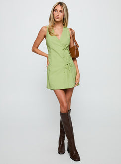front view of model wearing Princess Polly Kodee Mini Dress Sage V-Neck 