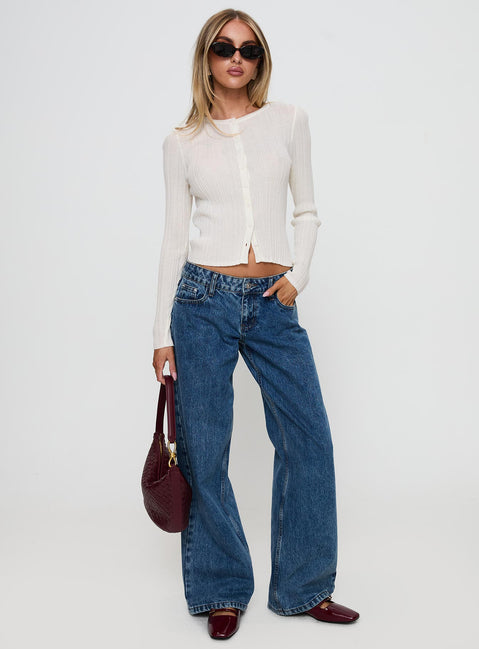 front view of model wearing Princess Polly Cowrie Long Sleeve Button Up Top White Full Sleeves Crew Neck 