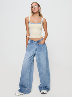 front view of model wearing Princess Polly Back In Time Top Cream/Blue Sleeveless Scoop Neck 