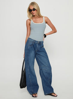 side view of model wearing Princess Polly Normana Mid Rise Cropped Barrel Jeans Mid Blue Wash Mid Rise Jeans 