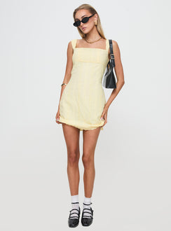front view of model wearing Princess Polly Allegro Mini Dress Lemon Square Neck 