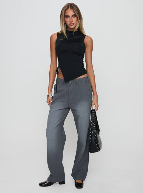 side view of model wearing Princess Polly Solarah Tie Side Top Black Sleeveless High Neck 