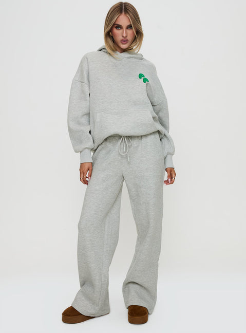 front view of model wearing Princess Polly Princess Polly Hooded Sweatshirt Bubble Text Grey Marle / Green 