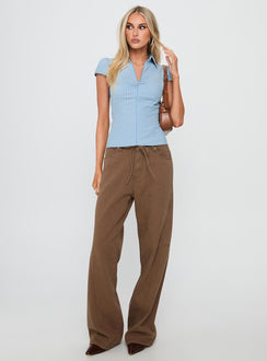 front view of model wearing Princess Polly Bruiser Mid Rise Wide Leg Jeans Brown Mid Rise 