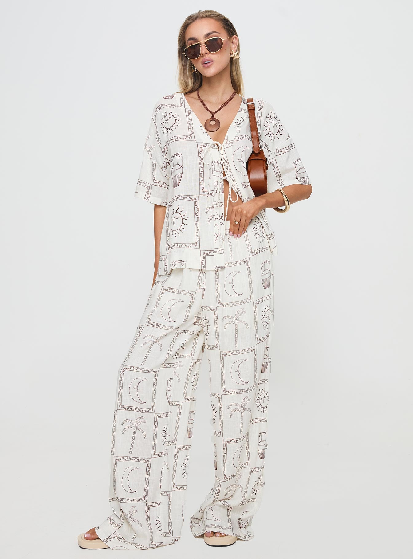 front view of model wearing Princess Polly Sun Dream Shirt Cream / Multi Half Sleeves Plunger 