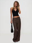 side view of model wearing Princess Polly Cedars Low Rise Pant Brown Stripe Low Rise Pants 