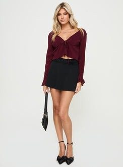 front view of model wearing Princess Polly Ignatius Long Sleeve Top Burgundy Full Sleeves Plunger 