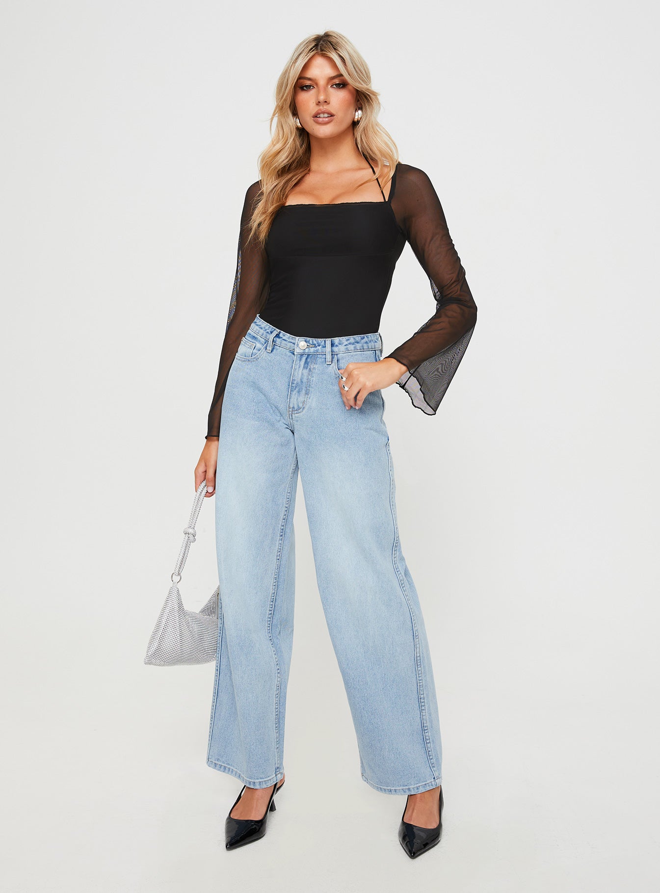 front view of model wearing Princess Polly Maryanne Mid-rise Relaxed Jeans Light Wash High Waisted 