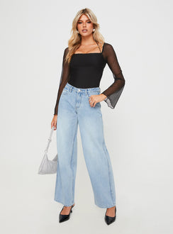 front view of model wearing Princess Polly Maryanne Mid-rise Relaxed Jeans Light Wash High Waisted 