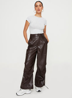 Front view of model wearing  front Princess Polly  Ornella Faux Leather Pants Brown