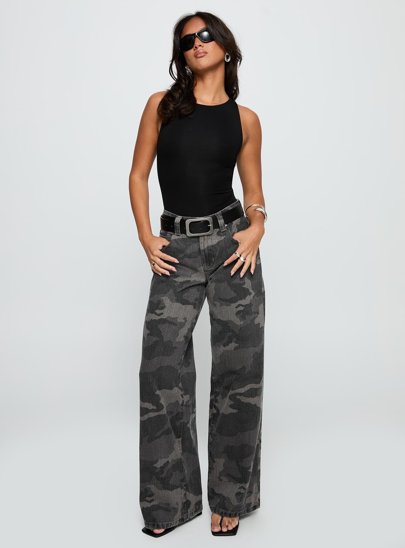 front view of model wearing Princess Polly Majesty Tie Back Bodysuit Black Sleeveless 