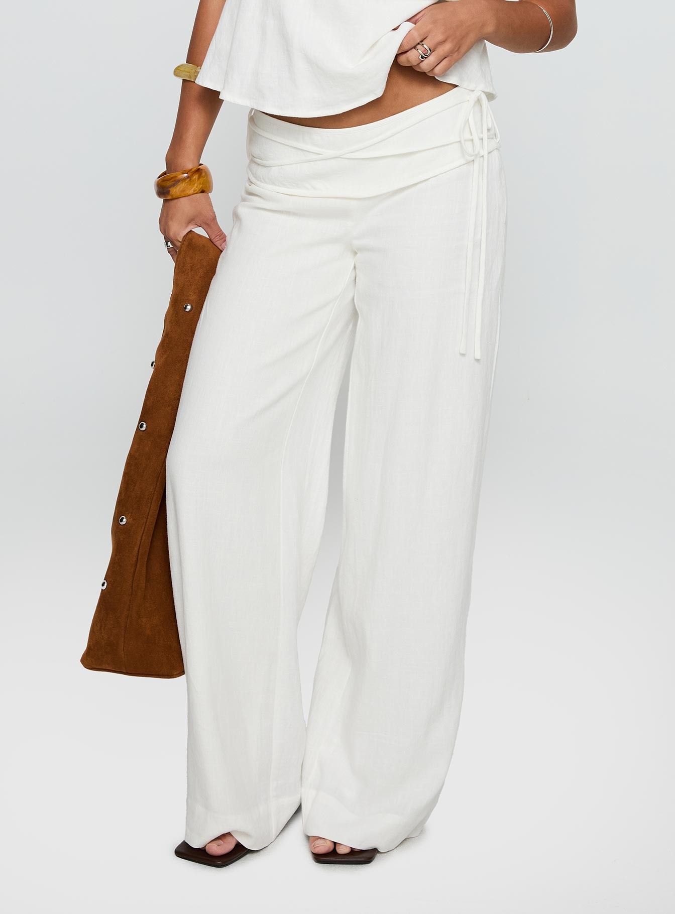 Showcasing Silver Moon Linen Blend Tie Pants White Petite womens regular pants with high-rise detail view of model wearing