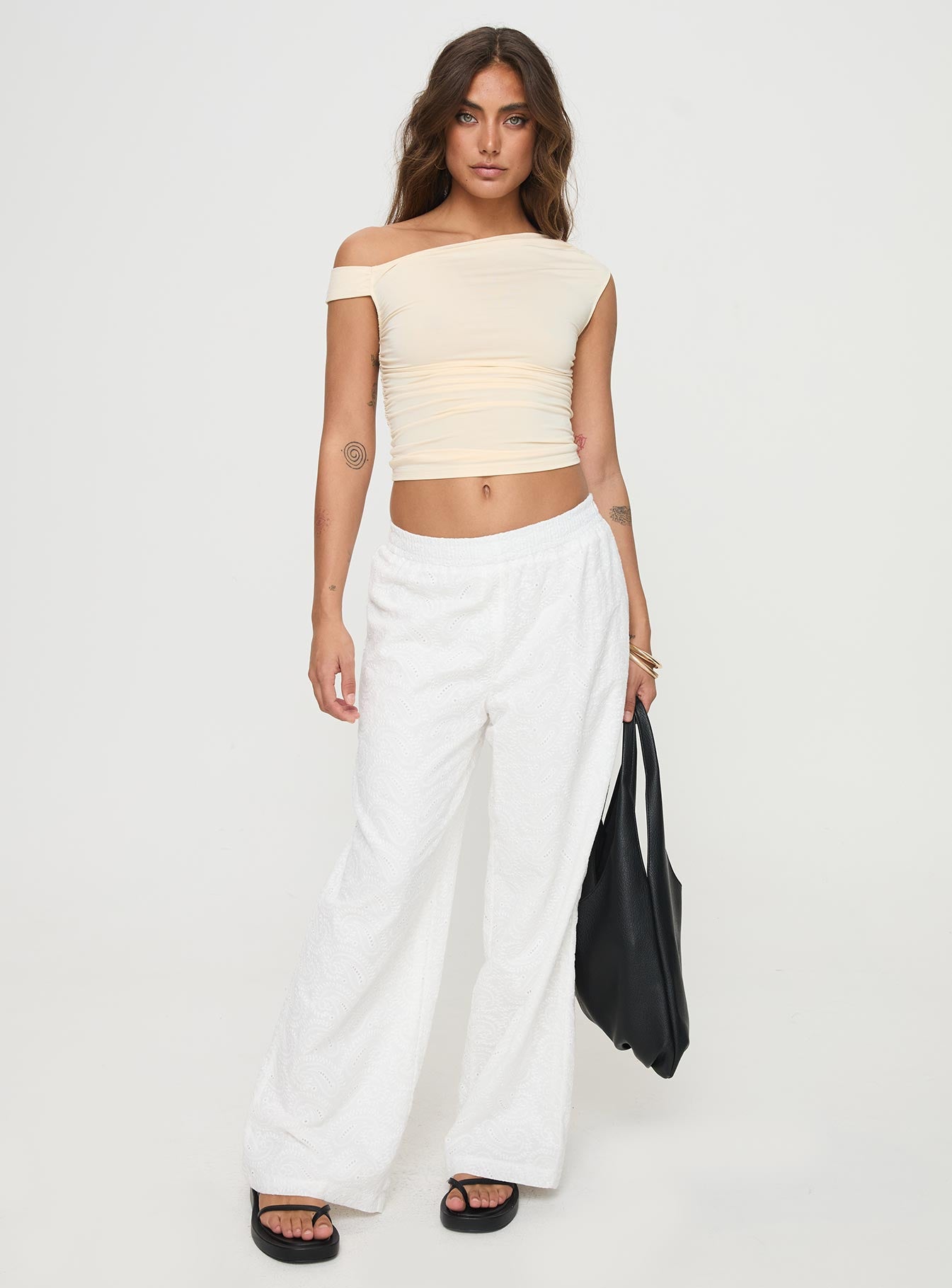 front view of model wearing Princess Polly Unfair Pants White Mid Rise 