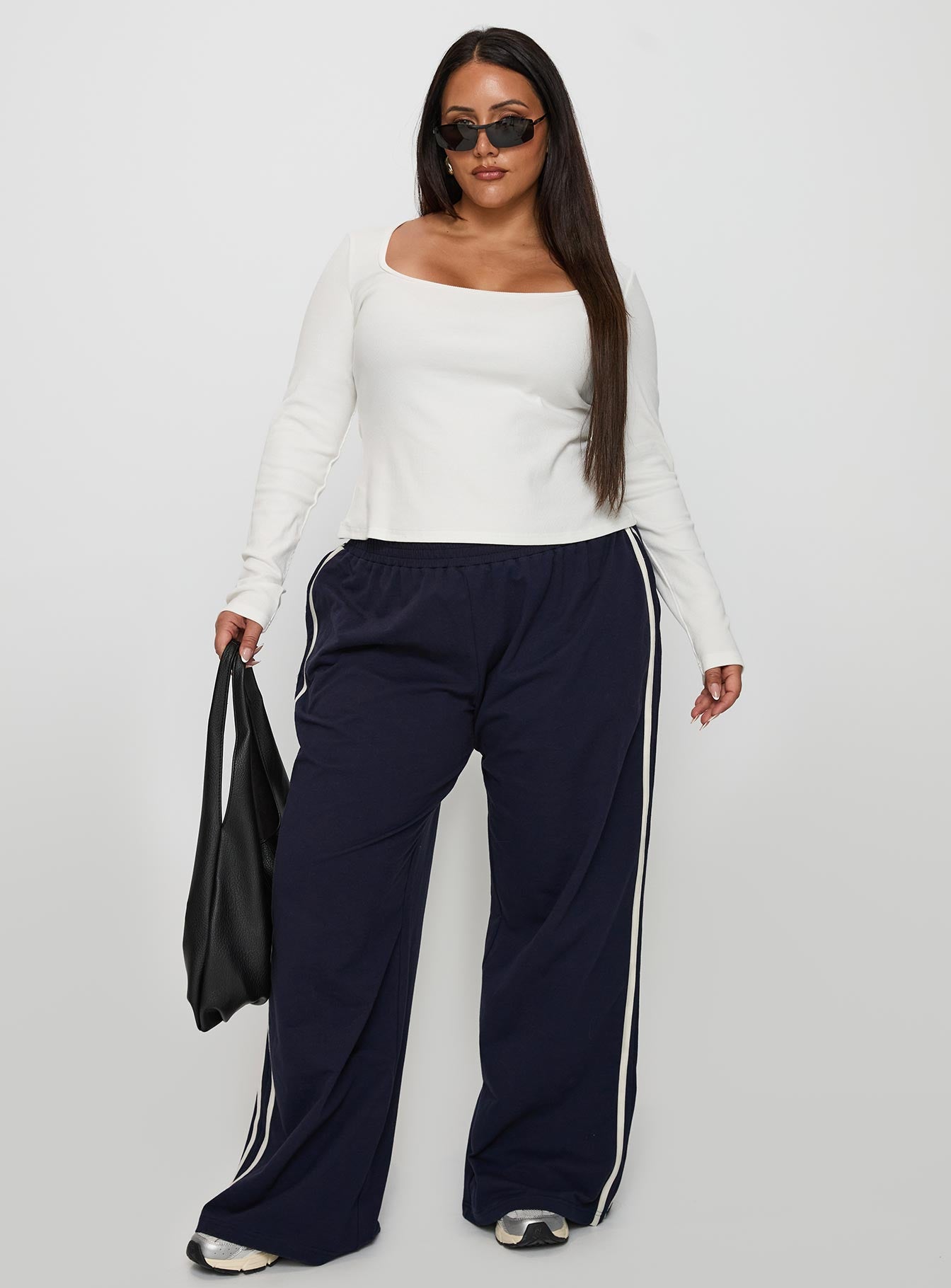 front view of model wearing Princess Polly Baseline Long Sleeve Top White Curve Full Sleeves Square Neck 