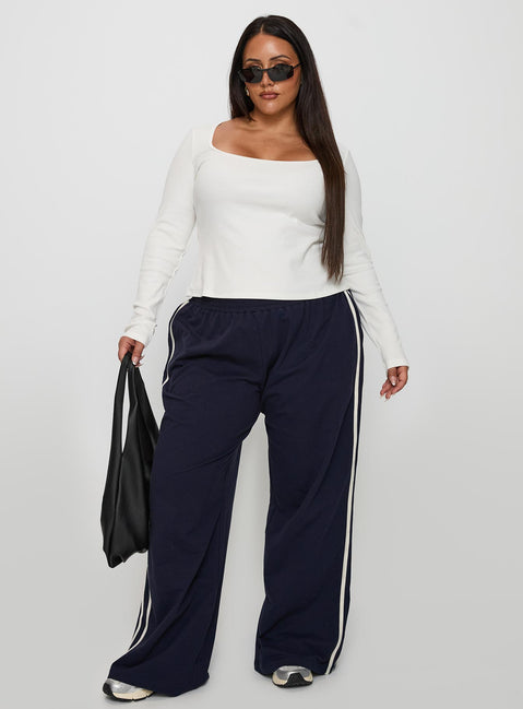 front view of model wearing Princess Polly Baseline Long Sleeve Top White Curve Full Sleeves Square Neck 