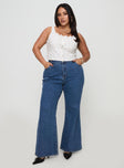 front view of model wearing Princess Polly Lucille High Rise Flare Leg Jeans Mid Wash Curve High Waisted 