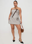 side view of model wearing Princess Polly Korren Low Rise Skort Plaid Curve High Waisted Shorts 